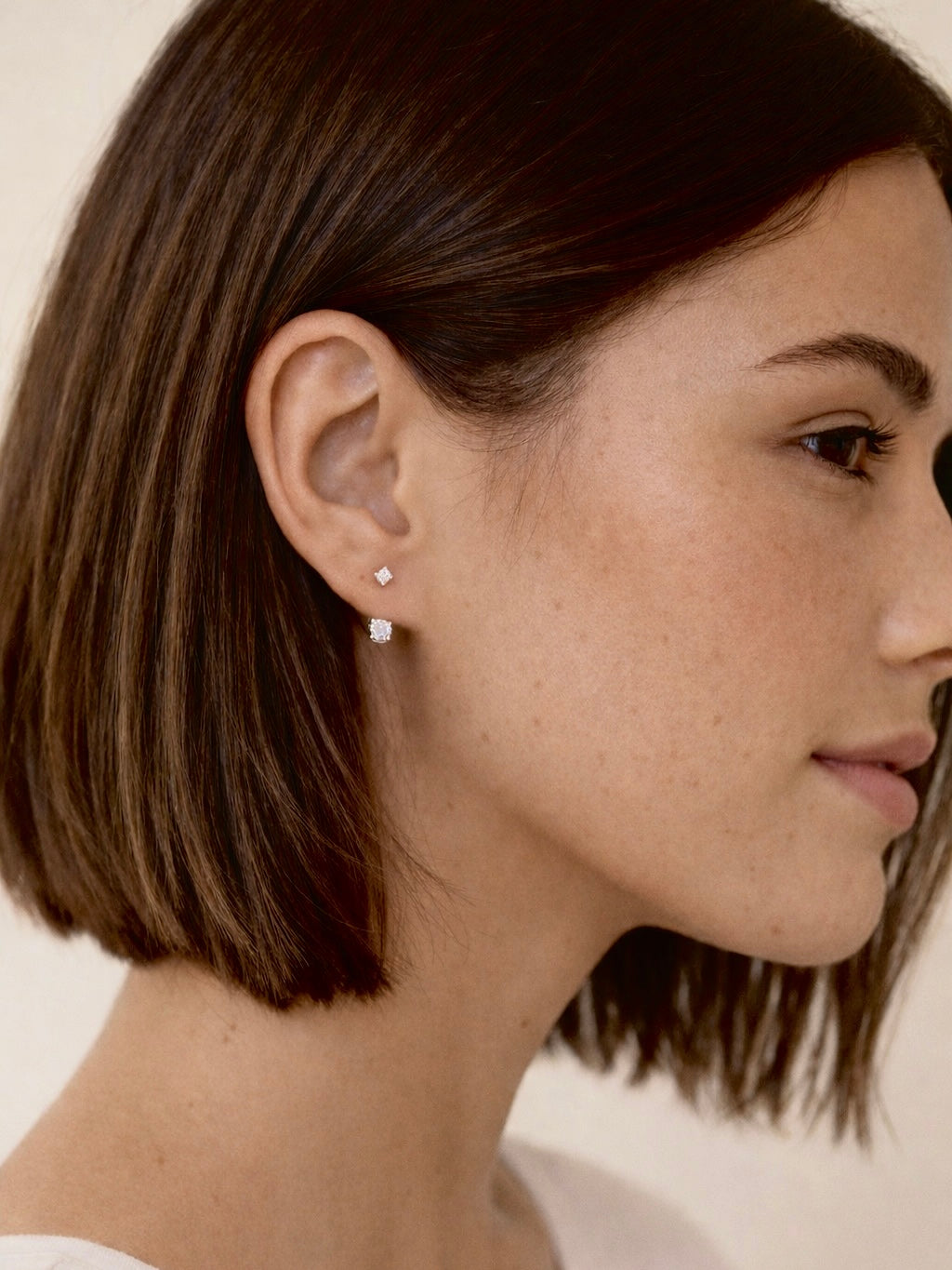 FLOATING DIAMOND STUDS